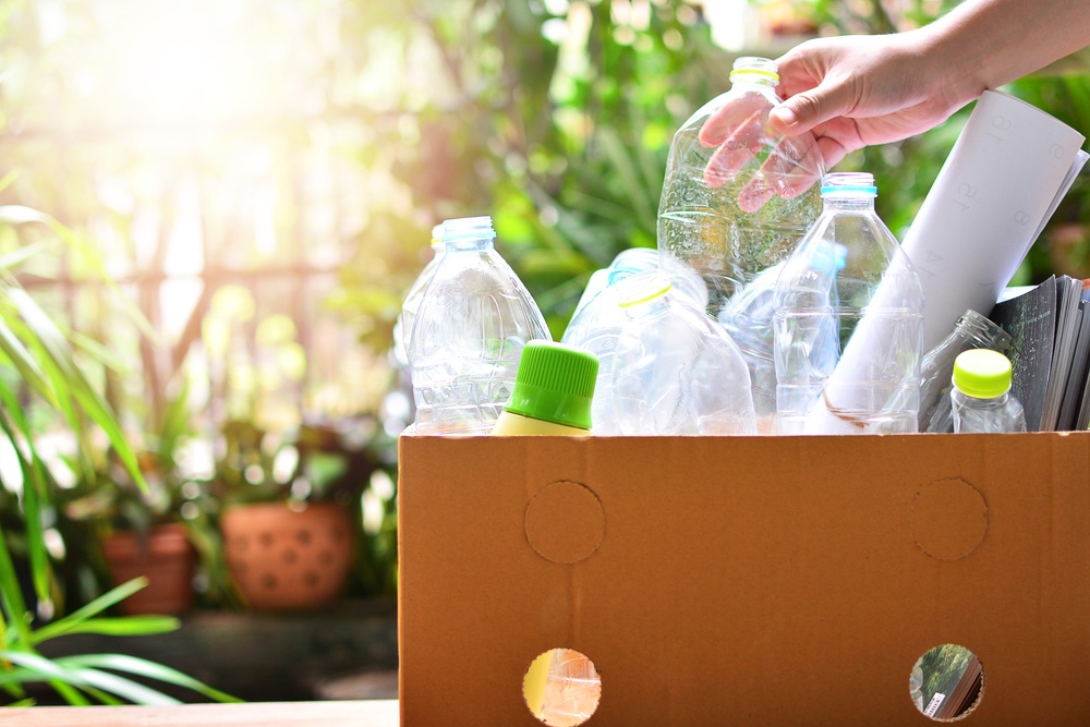 Putting recyclable plastics in a box