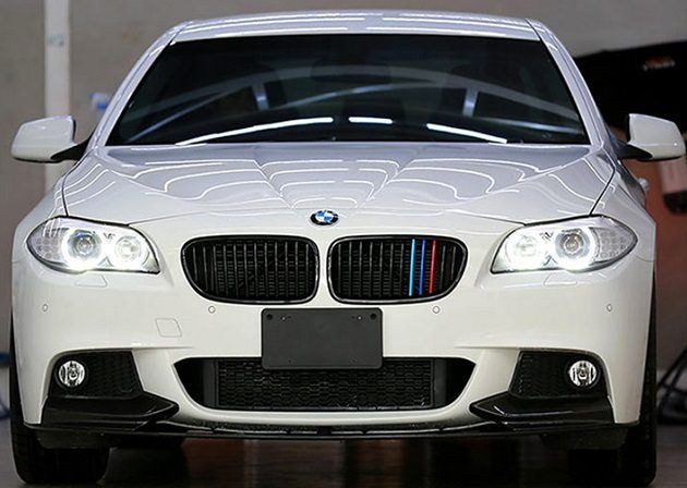 front view of white BMW sedan