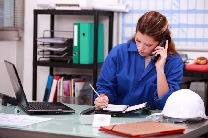 Person working hard at their desk as an example of jobs for people with no skills