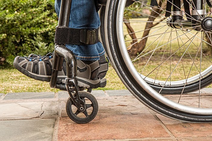 Man in a wheelchair as an example of jobs for quadriplegics