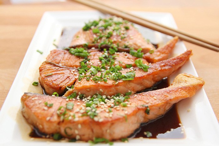 Photo of a plate of salmon as an example of getting paid to write about food