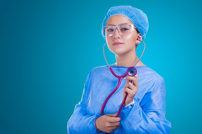 Photo of a nurse holding a stethoscope as an example of nursing articles