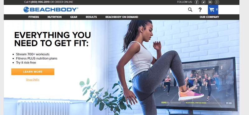 Beachbody website screenshot showing a woman exercising in front of the television. 