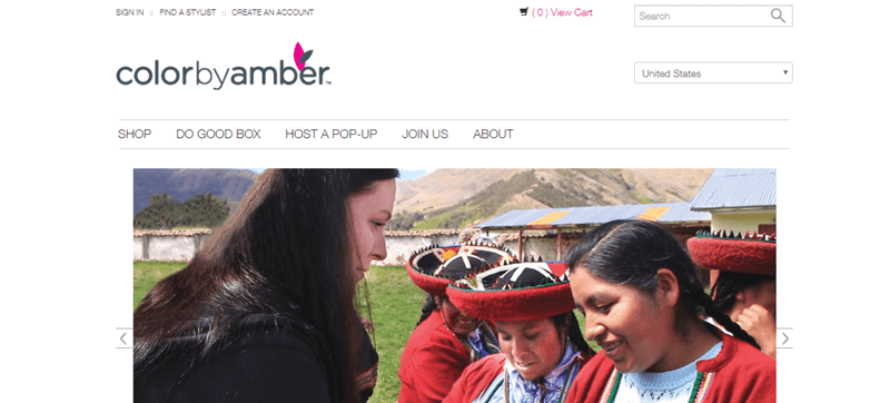 Color by Amber website showing a woman interacting with people from another culture. 