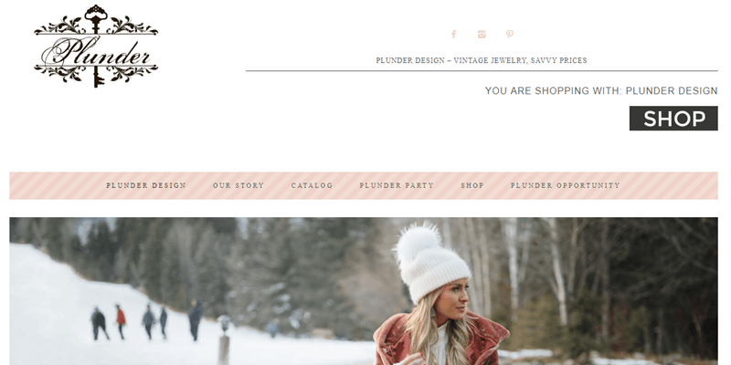 Plunder Design website screenshot showing a woman in the snow, along with various links for purchasing. 