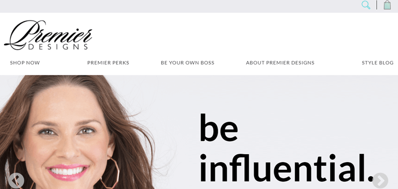 Premier Designs website screenshot showing a smiling brown haired woman with the words ‘be influential’ next to her. 