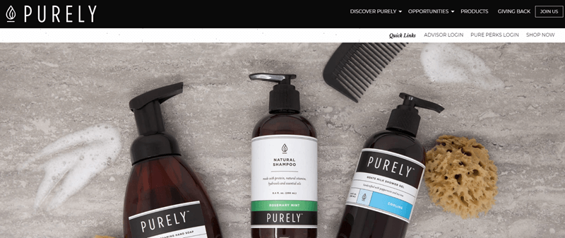 Purely website screenshot showing three bottles of product, a comb and a sponge. 