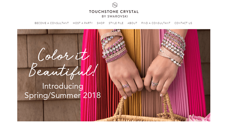 Touchstone Crystal website screenshot showing a woman with many different pink and white bracelets (and some rings). 