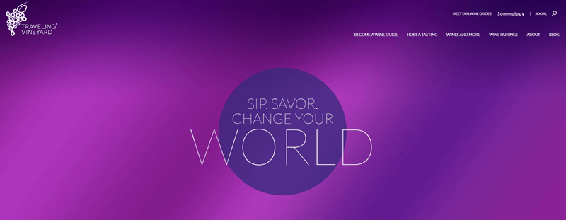 Traveling Vineyard website screenshot showing a purple background and the phrase ‘Sip. Savor. Change Your World’. 