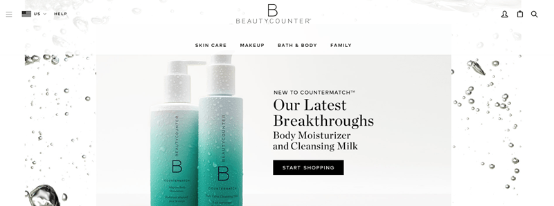 BeautyCounter website screenshot showing a white background with bubbles, along with two products from the company. 