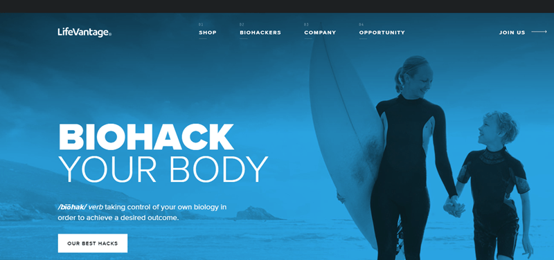 LifeVantage website screenshot showing a young boy and his mother, with the mother holding a surfboard. 