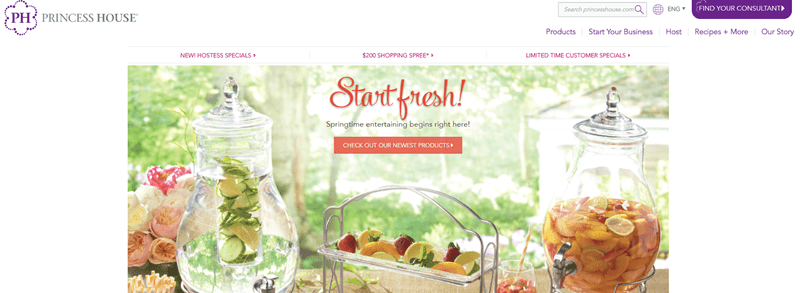 Princess House website screenshot showing two large jugs with infused water and a serving platter. 