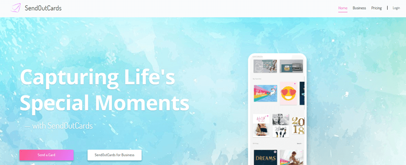 SendOutCards website screenshot showing a blue background and a mobile app from the company. 