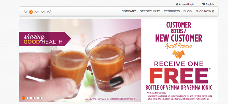 Vemma website screenshot showing two people sharing shots of the Vemma drink. 