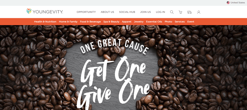 Youngevity website screenshot showing coffee beans on a table with the words ‘one great cause’ and ‘get one give one’. 