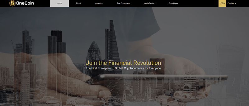 Onecoin website screenshot showing an image of a city, along with an image of a man holding a tablet. 