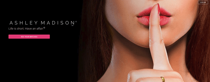 Ashley Madison website screenshot shows an image of a brunette woman with her finger to her lips. 