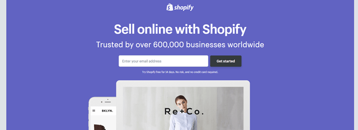 Shopify website screenshot showing a blue background with a website on a tablet and another on a phone. 