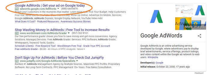 This is a screenshot of Google results page. The orange circle is placed over an example of a pay-per-click ad.