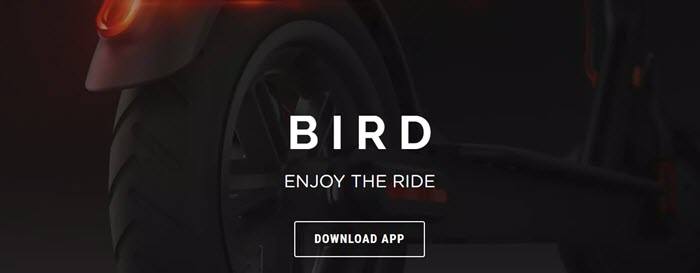 Bird website screenshot showing a closeup image of one of the Bird scooters against a black background. 