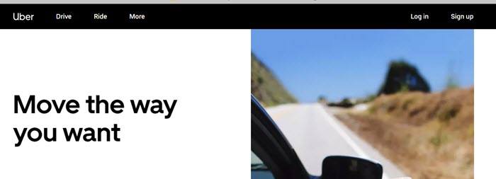 Uber website screenshot showing a small image of a car driving on an open road. 