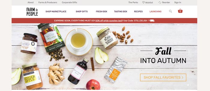 Farm to People website screenshot showing a selection of the products and some ingredients against a white wooden background.