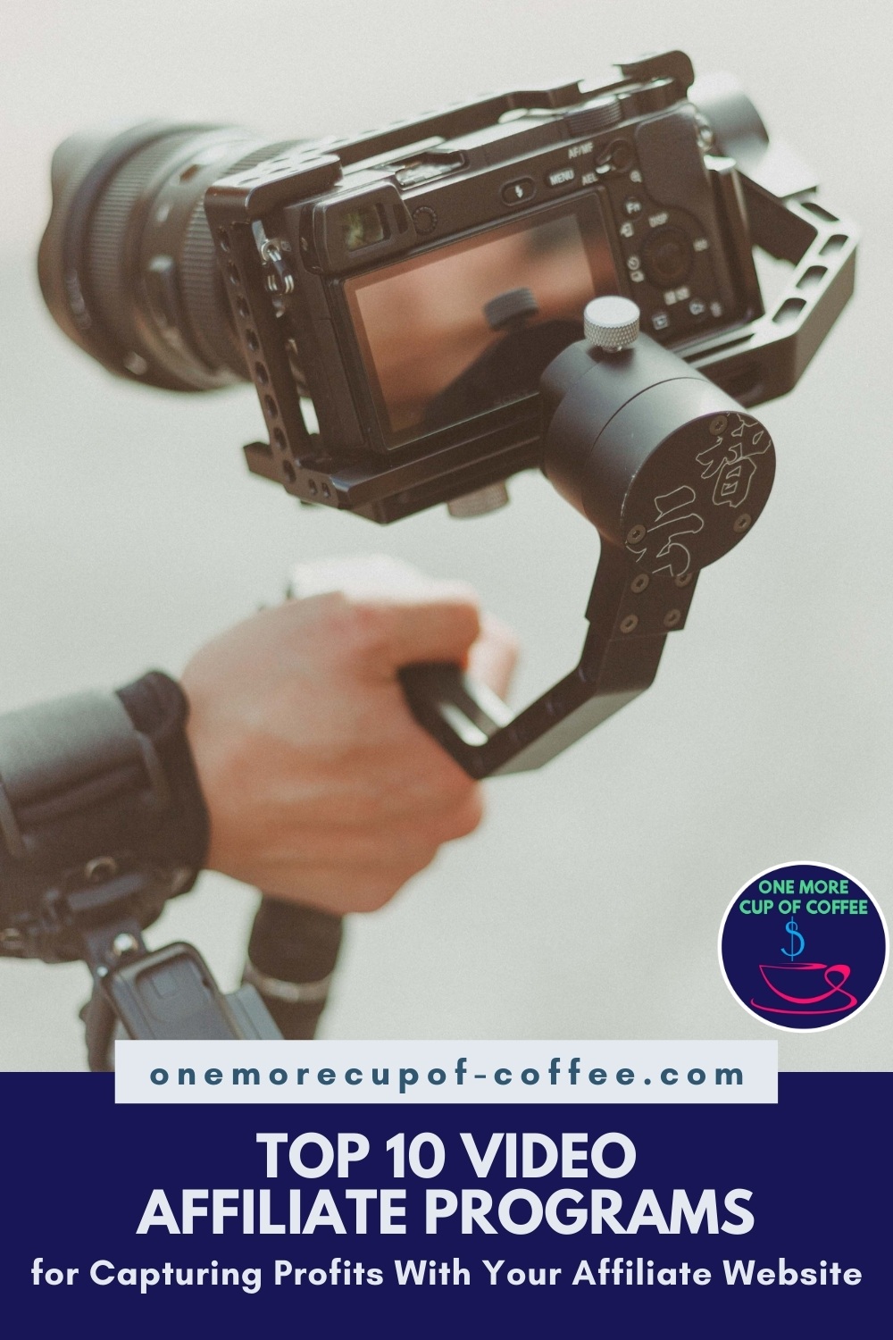 hand holding a dslr camera mounted to a camera stabilizer; with text overlay "Top 10 Video Affiliate Programs For Capturing Profits With Your Affiliate Website"