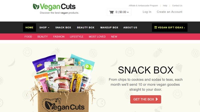 Vegan Cuts website screenshot showing the open box with various snacks, along with menu items. 