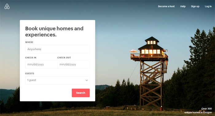 Airbnb website screenshot showing a freestanding loft-style house contrasted against the open sky.