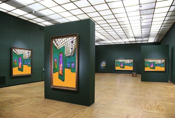 empty gallery museum with stock imagery on the paintings representing museum affiliate programs