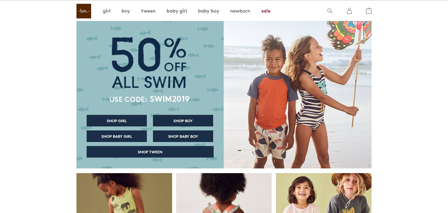 A 50% off sales add for children's swimwear and two children playing in bright-colored swim clothes at the beach are the main features of this Tea Collection screenshot.