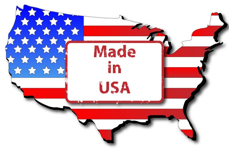 This image shows the shape of the continental United States as a flag, with a blue and white starred section in the upper left corner and horizontal red and white stripes, with a white text box containing the words "Made in USA" in the center, representing the best American Made Affiliate Programs.