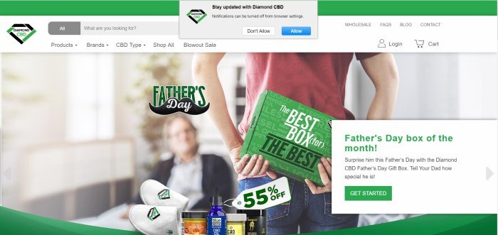 This screenshot of the home page for Diamond CBD includes a photo of a young woman with a green boxed Father's Day gift of Diamond CBD products in her hands behind her back, while she faces her father across the room, and a Father's Day bundle call-to-action in a white box with green and black lettering.