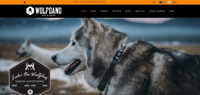 This screenshot of the home page for Wolfgang Man & Beast shows a photo of a husky wearing a nice, heavy-duty collar. 