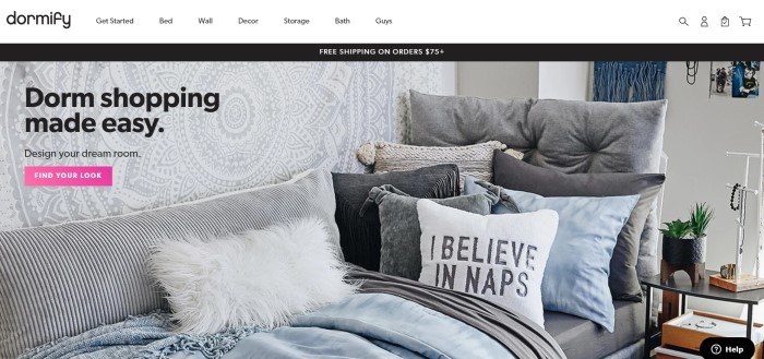  This screenshot of the home page for Dormify shows a dorm bed made up in gray and blue bedding, next to a white and gray wall, behind black lettering reading 'Dorm room shopping made easy' and a pink call-to-action button for shopping.