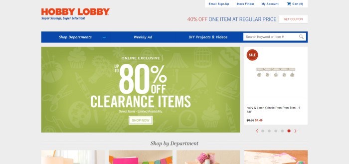 This screenshot of the home page of Hobby Lobby has a blue navigation bar, a white background, and a large green section advertising an 80% off sale, above a row of smaller photos of trending products.