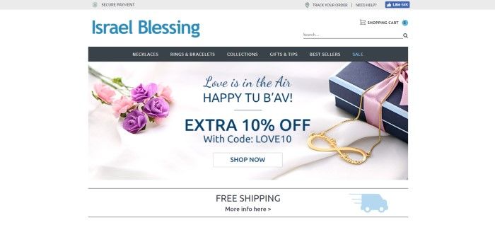 This screenshot of the home page for Israel Blessing has a white background, a black header, and a photo with a white fabric background, purple and pink flowers, a blue gift box with a purple ribbon, and an golden personalized necklace.