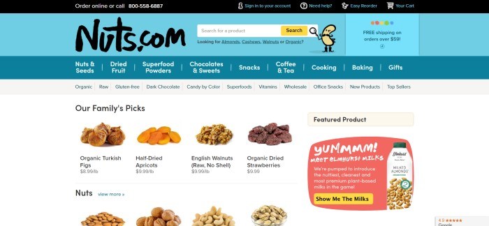 This screenshot of the home page for nuts.com has a blue header above a white background showing several nuts and dried fruit products.