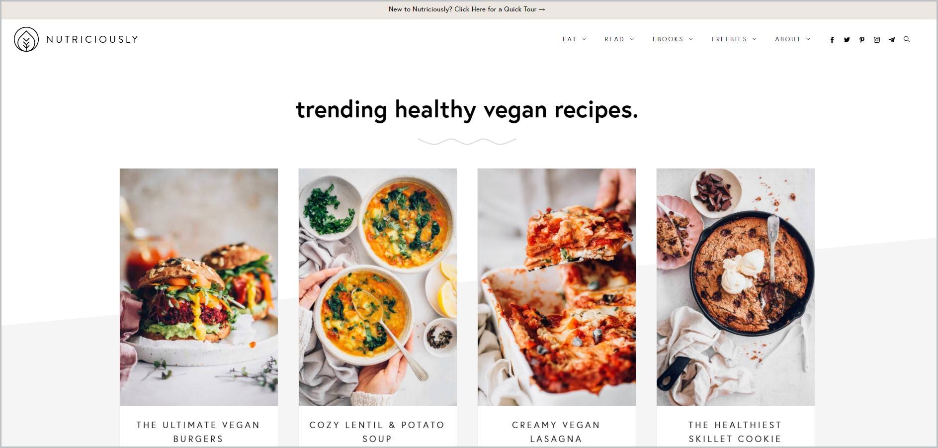 screenshot of Nutriciously homepage showcasing beautifully plated vegan dishes