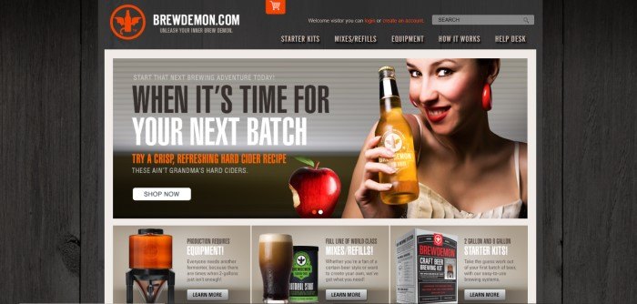  This screenshot of the home page for Brew Demon has a background of dark gray wood, along with a photo of a woman holding a golden-colored glass bottle with the Brew Demon logo on it and three other product photos with text.