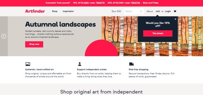 This screenshot of the home page for Artfinder has a red header with a coupon code above gray and beige sections with red and black text introducing original autumnal landscapes from independent artists, as well as a 10% discount offer and a red call-to-action button.