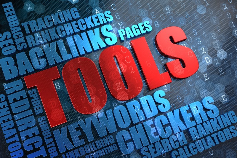  This images shows a dark blue background with the word 'Tools' in red, surrounded by light blue words such as 'Backlinks' and 'Keywords', representing the best SEO tools affiliate programs.