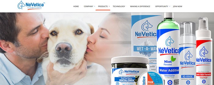 An image from the NeVetica website showing a man and a woman kissing a dog