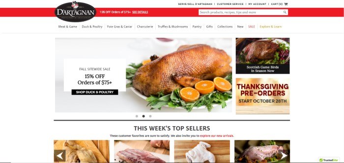 This screenshot of the home page for D'Artagnan shows a red header announcing a 15% off discount, a white background, a large photo of a roasted duck with orange slices, an advertisement for Thanksgiving pre-orders, and a small photo with an advertisement for Scottish game birds.