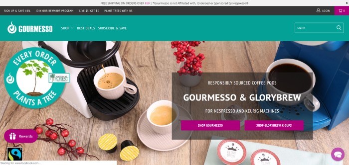 This screenshot of the home page for Gourmesso has a photo of espresso dripping into a white cup on an expresso machine near a vase of red berried branches on a rustic table.