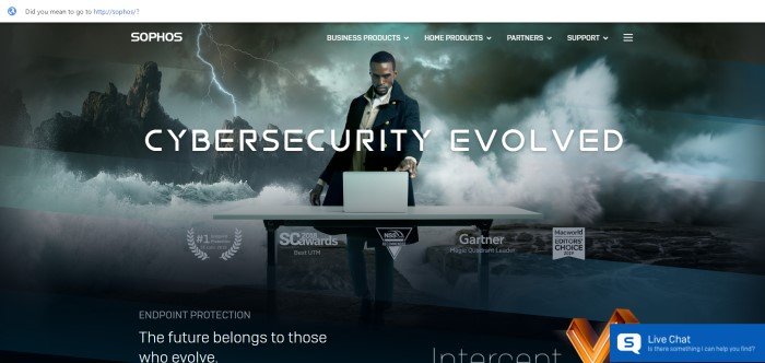 This screenshot of the home page for Sophos has a photo of a dark-haired man in an old-fashioned sea captain's outfit, in front of a sky full of lightening and a stormy sea, and behind a table with an open laptop, along with words in white lettering that read 