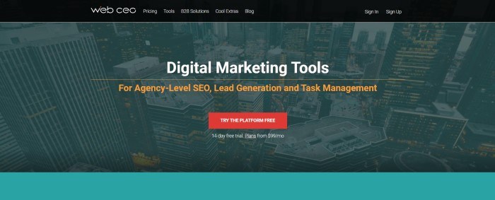 This screenshot of the home page for WebCEO has a dark filtered photo of city buildings behind white marketing introducing digital marketing tools and a red call-to-action button for a free trial period.