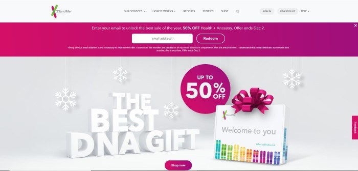 This screenshot of the home page for 23 And Me has a white navigation bar with black text above a maroon opt-in window and a photo of a DNA testing kit on a white background with a 50% off offer, snowflakes, and white words that read "The best DNA gift" behind it.