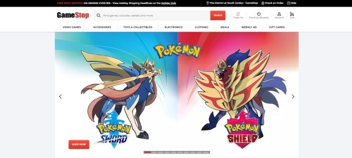 This screenshot of the home page for GameStop has a light gray background with the GameStop logo in black and red above two screen images of the Pokemon characters Sword and Shield in backgrounds of red and blue, along with a red call-to-action button. 