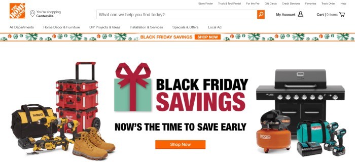 This screenshot of the home page for the Home Depot has a white header and background with the orange logo, a black Friday savings advertisement bar with green snowflakes, and a large advertisement section with text in black and red announcing Black Friday savings, along with several images of Home Depot products including tools and a grill. 